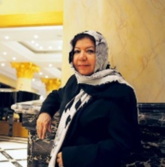 Mrs. Thuraya Arrayed